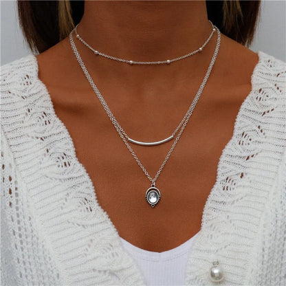 ENCHANTING MULTI-PENDANT LAYERED NECKLACE