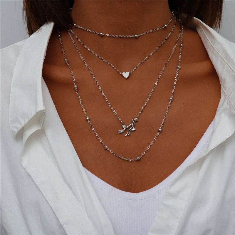 ENCHANTING MULTI-PENDANT LAYERED NECKLACE
