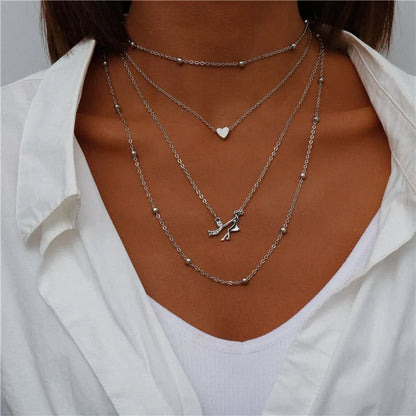 ENCHANTING MULTI-PENDANT LAYERED NECKLACE